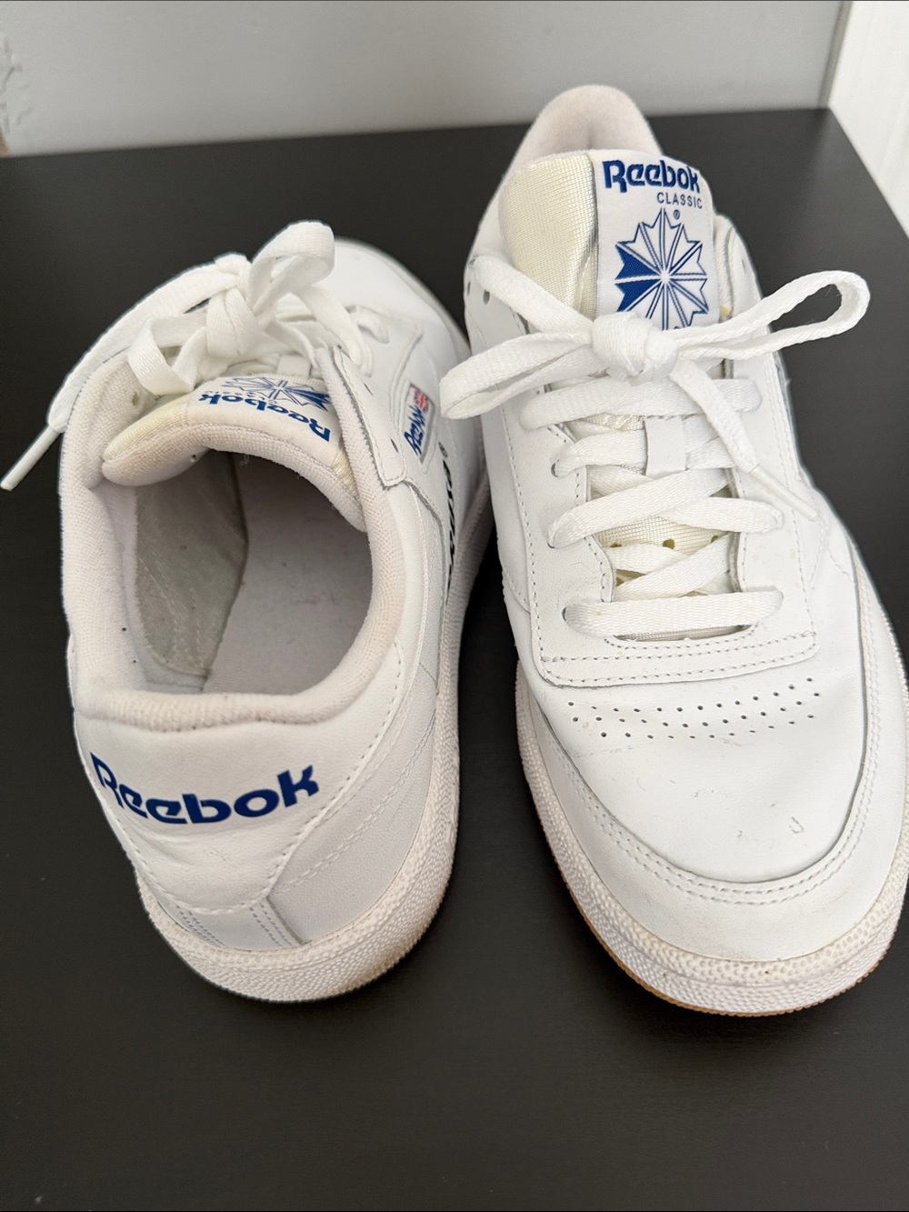 Reebok White Low-Top Sneakers with Blue Logo